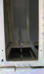 Trappe de visite d'une grille sécurisée